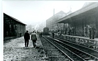 Delph station in 1956 during an enthusiasts railtour after closure of the line.